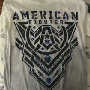 This is an amazing blue white and gray american fighter shirt